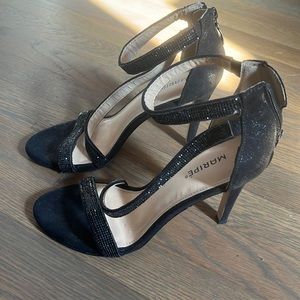 Black open toed heels with black glitter around bands